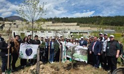 100 Fidan Toprakla Buluştu