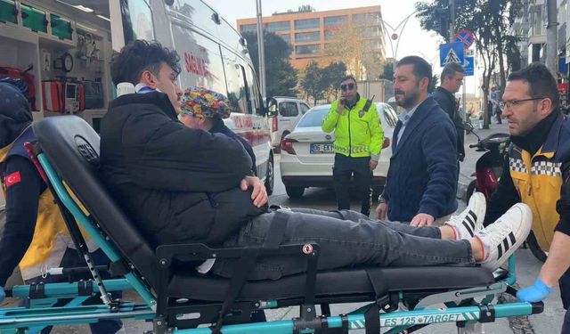 Otomobile çarpmamak isterken düşen motosiklet sürücüsü yaralandı