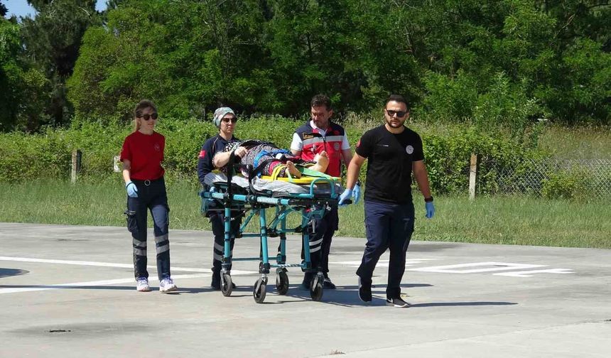 Yüksekten düşen kadının imdadına ambulans helikopter yetişti